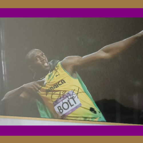 Usain Bolt Signed Photo and Medal